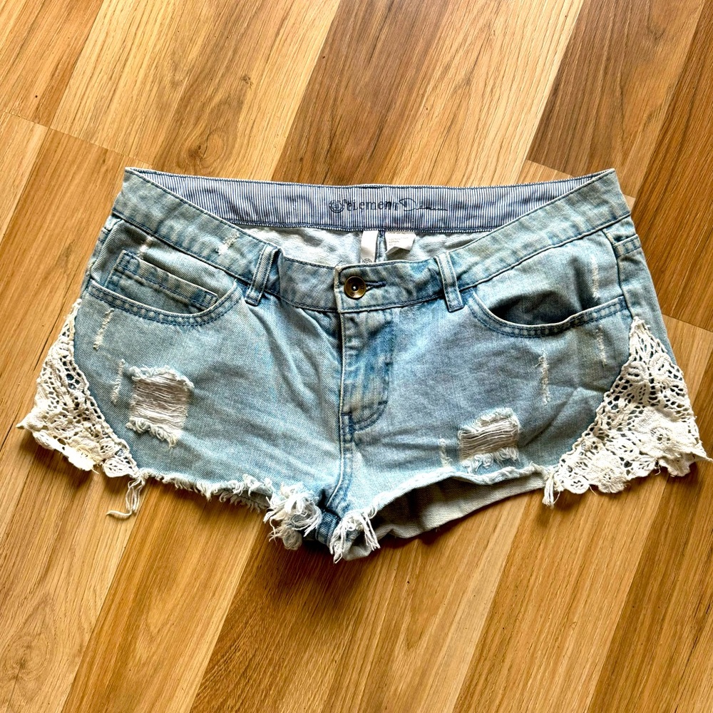 Distressed denim shorts